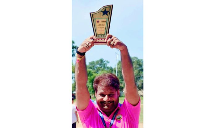 Deepak Dutta posing with the Golden Star Award in Jammu on Wednesday. Deepak Dutta posing with the Golden Star Award in Jammu on Wednesday.