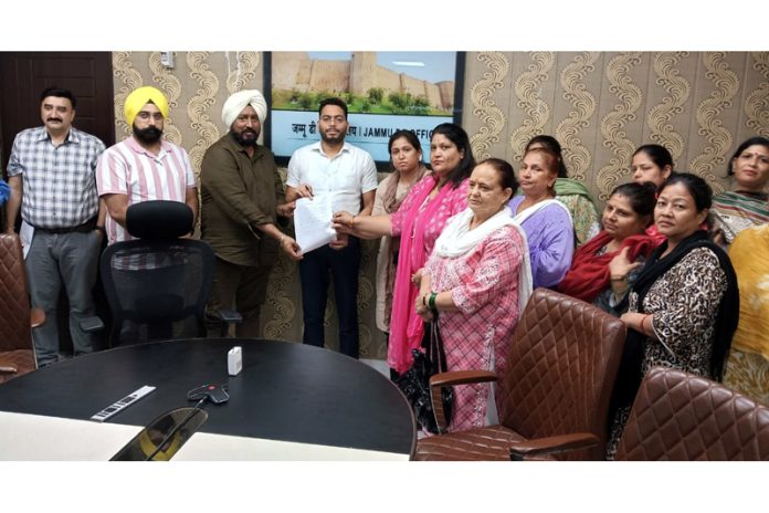Taranjit Singh Tony and others submitting memorandum to DC Jammu. Taranjit Singh Tony and others submitting memorandum to DC Jammu.