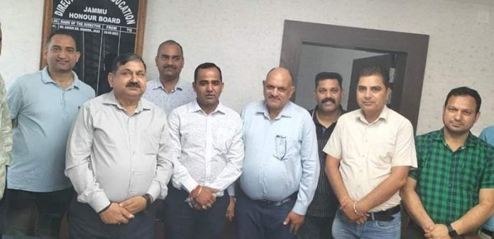 Members of deputation of Teachers posing for a photograph after meeting DSE Jammu on Friday.