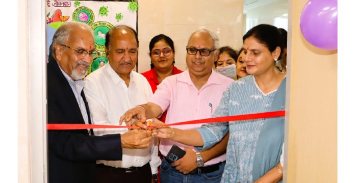 President AIIMS Jammu Prof Y K Gupta, Executive Director AIIMS, Dr Shakti Gupta launching immunisation services on Friday.