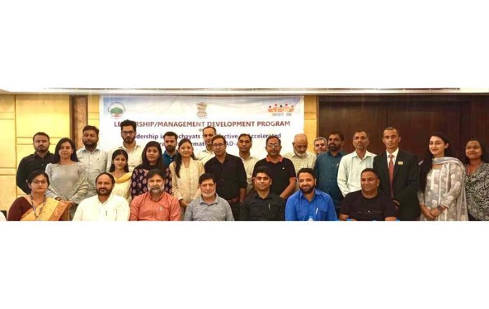 Dignitaries posing for a group photograph during a function in Jammu on Sunday. Dignitaries posing for a group photograph during a function in Jammu on Sunday.