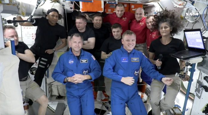 SpaceX capsule Dragon's crew at ISS
