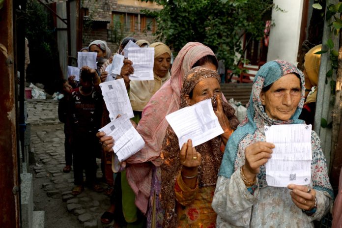 Women voters outside a Polling Station in Srinagar on Wednesday. -Excelsior/Shakeel Women voters outside a Polling Station in Srinagar on Wednesday. -Excelsior/Shakeel