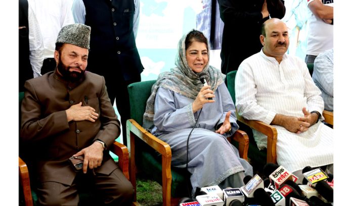 PDP President Mehbooba Mufti speaking with media during a joining ceremony in Srinagar on Sunday. -Excelsior/Shakeel