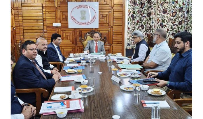 Chief Justice Tashi Rabstan along with CS Atal Dulloo and other officers during a meeting on Monday. Chief Justice Tashi Rabstan along with CS Atal Dulloo and other officers during a meeting on Monday.