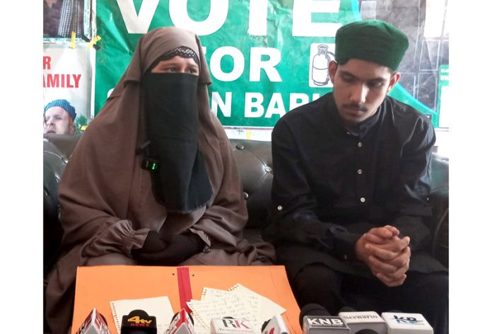 Sugra Barkati during a press conference along with her younger brother in Magam on Sunday. -Excelsior/Shakeel Sugra Barkati during a press conference along with her younger brother in Magam on Sunday. -Excelsior/Shakeel