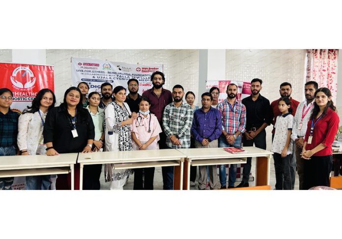 Members of LFO-BHF along with others posing for a group photograph during a medical camp in Jammu. Members of LFO-BHF along with others posing for a group photograph during a medical camp in Jammu.