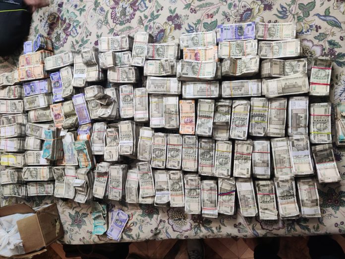 CBI seizes Rs 2.39 Cr in cash from premises of DPCC engineer accused of bribery CBI seizes Rs 2.39 Cr in cash from premises of DPCC engineer accused of bribery