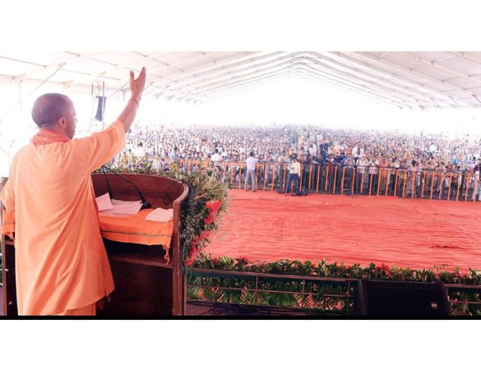 page1-6 UP Chief Minister Yogi Adityanath addressing an election rally in Jammu on Thursday.