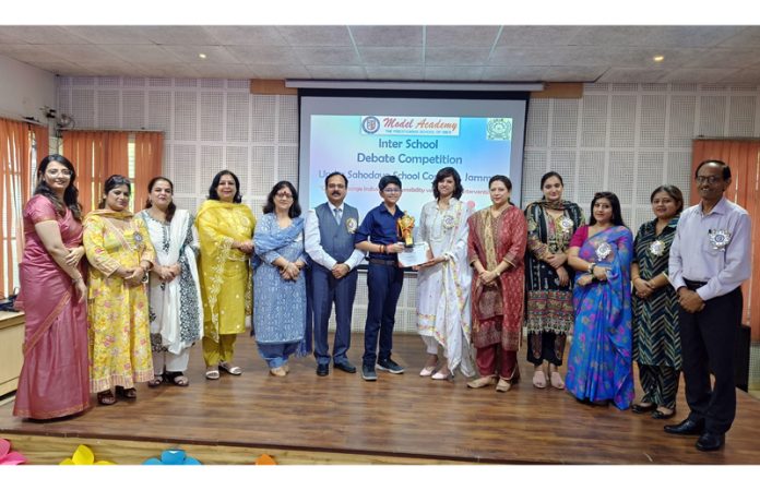 School Management posing along with a winner during award ceremony at Jammu. School Management posing along with a winner during award ceremony at Jammu.