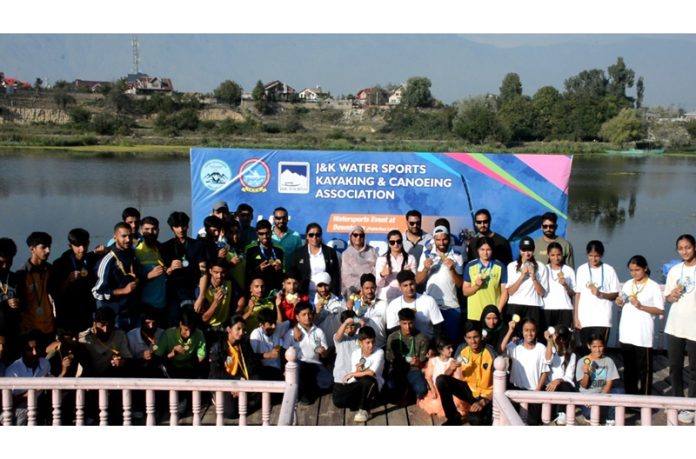 Athletes posing along with dignitaries during 10th UT Canoe Sprint Championship at Srinagar. Athletes posing along with dignitaries during 10th UT Canoe Sprint Championship at Srinagar.