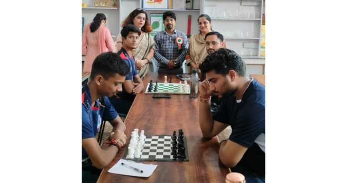 Players displaying keen interest during Inter-College Chess tournament at Jammu. Players displaying keen interest during Inter-College Chess tournament at Jammu.