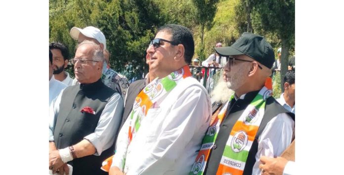 Senior bureaucrat, Rashid Azam Inqlabi with JKPCC president Tariq Hameed Karra and party candidate Iftikhar while joining party in Rajouri on Tuesday. Senior bureaucrat, Rashid Azam Inqlabi with JKPCC president Tariq Hameed Karra and party candidate Iftikhar while joining party in Rajouri on Tuesday.