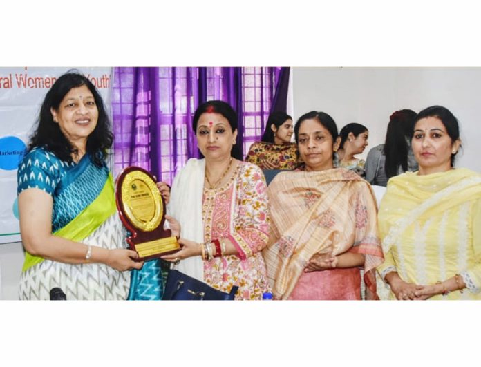 Staff with the guest at SKUAST-J function.