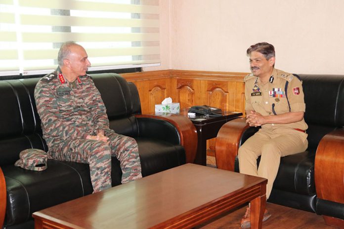 Lt Gen Rajiv Ghai interacting with DGP RR Swain in Srinagar on Friday. Lt Gen Rajiv Ghai interacting with DGP RR Swain in Srinagar on Friday.