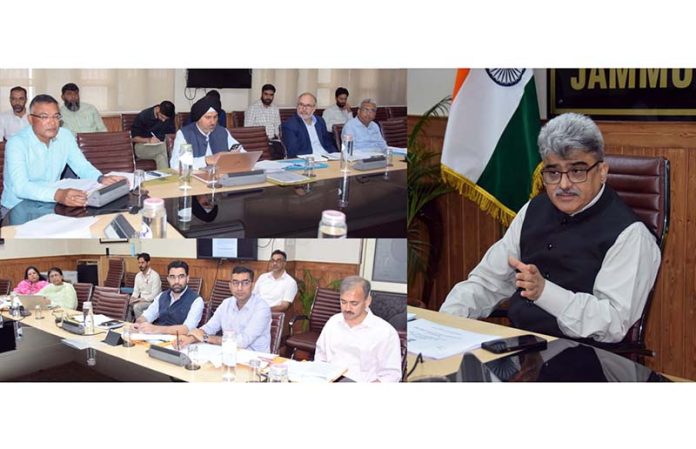 Chief Secretary chairing a meeting at Srinagar on Monday.