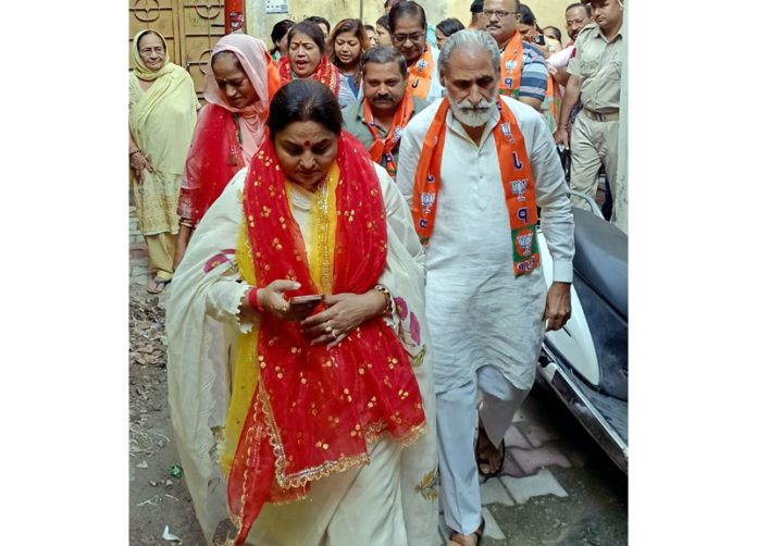 Former Minister, Priya Sethi during a door to door campaign in Jammu East on Sunday. Former Minister, Priya Sethi during a door to door campaign in Jammu East on Sunday.