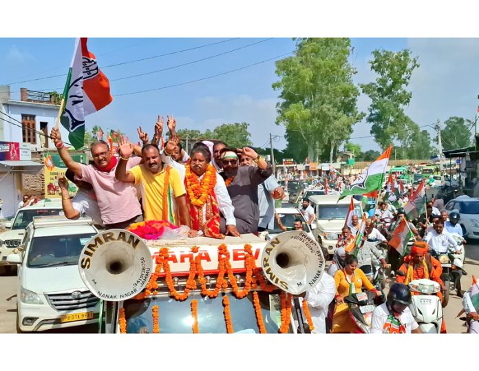 Cong candidate from Jammu South Raman Bhalla leading a Cong rally on Sunday. Cong candidate from Jammu South Raman Bhalla leading a Cong rally on Sunday.