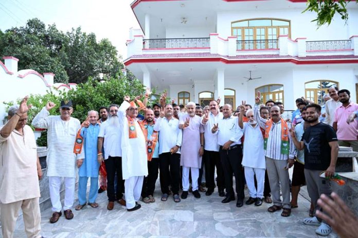 BJP nominee for Jammu North Assembly segment, Sham Lal Sharma with his supporters at Kot Bhalwal, Jammu. BJP nominee for Jammu North Assembly segment, Sham Lal Sharma with his supporters at Kot Bhalwal, Jammu.