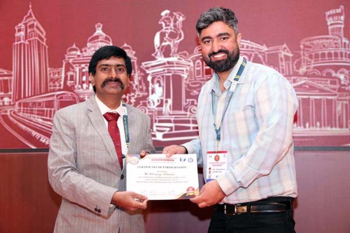 Dr Abhimanyu Rohmetra receiving participation certificate from a dignitary at 58th Indian Orthodontic Conference in Bangalore. Dr Abhimanyu Rohmetra receiving participation certificate from a dignitary at 58th Indian Orthodontic Conference in Bangalore.