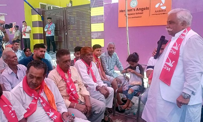 NC candidate from Jammu North constituency, Ajay Sadhotra addressing a public meeting at Old Janipur, Jammu. NC candidate from Jammu North constituency, Ajay Sadhotra addressing a public meeting at Old Janipur, Jammu.