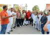 BJP candidate for Jammu West, Arvind Gupta posing for a photograph with supporters during campaigning.