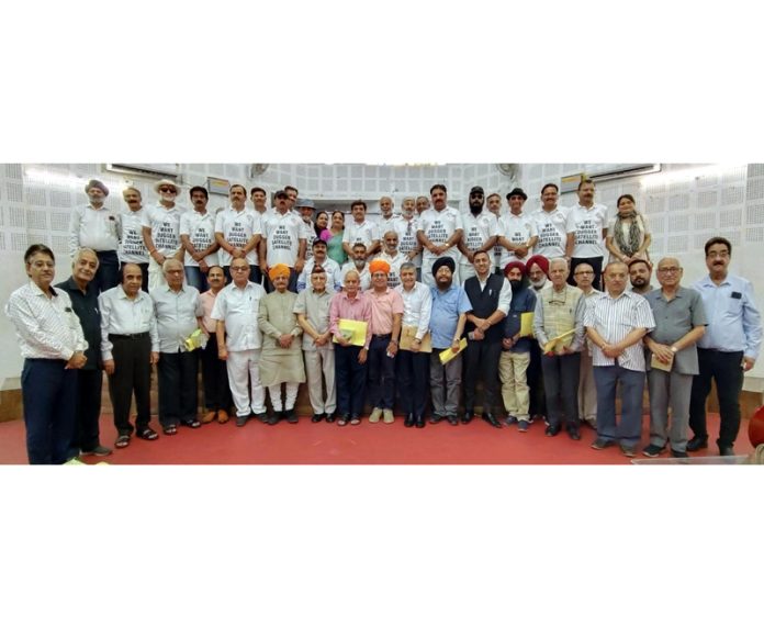 Dignitaries posing for a group photograph during a function organized in Jammu on Tuesday. Dignitaries posing for a group photograph during a function organized in Jammu on Tuesday.