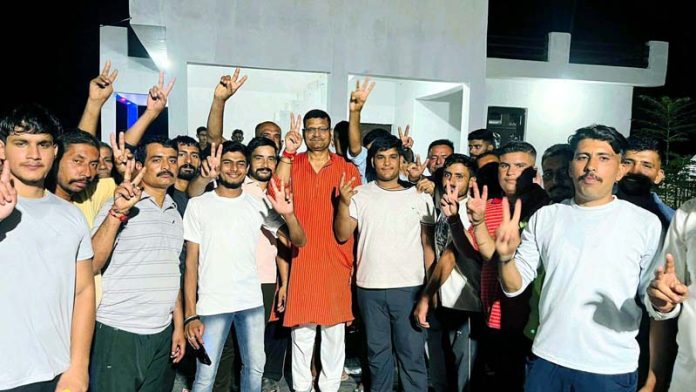 M L Kaith with his supporters during a public meeting in Marh. M L Kaith with his supporters during a public meeting in Marh.