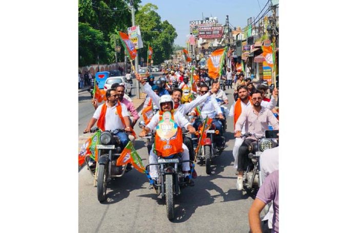 BJP activists taking out bike rally in Jammu East on Monday. BJP activists taking out bike rally in Jammu East on Monday.