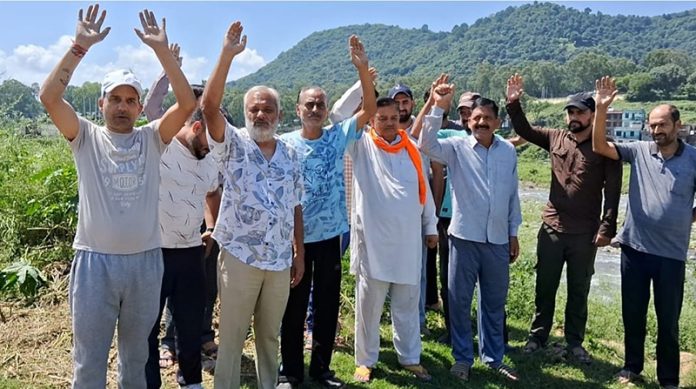 People protesting near Badala in Rajouri on Monday. -Excelsior/ Imran