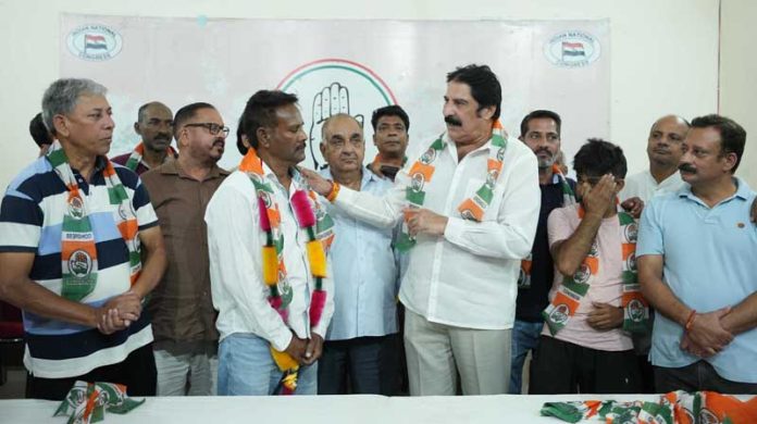 Congress candidate from Jammu East Yogesh Sawhney welcoming new entrants into party in Jammu. Congress candidate from Jammu East Yogesh Sawhney welcoming new entrants into party in Jammu.