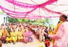 BJP contesting candidate from Akhnoor constituency, Mohan Lal Bhagat addressing a public meeting at Bomal.