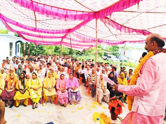 BJP contesting candidate from Akhnoor constituency, Mohan Lal Bhagat addressing a public meeting at Bomal. BJP contesting candidate from Akhnoor constituency, Mohan Lal Bhagat addressing a public meeting at Bomal.