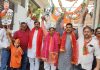 Senior BJP leader Sat Sharma along with others attending a function in Jammu on Sunday.