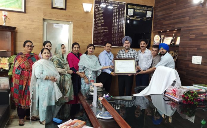 Director Agriculture Jammu, Dr AS Reen and his team posing with NABL accreditation certificate. Director Agriculture Jammu, Dr AS Reen and his team posing with NABL accreditation certificate.