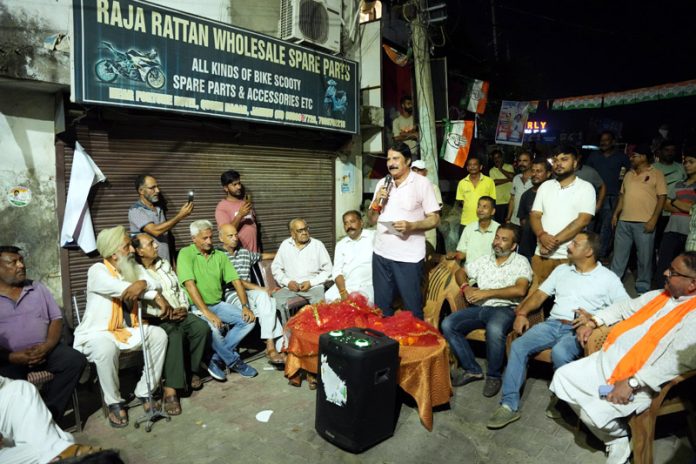 Cong candidate Yogesh Sawhney addressing election meeting in Jammu East on Wednesday. Cong candidate Yogesh Sawhney addressing election meeting in Jammu East on Wednesday.