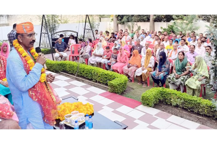 BJP Akhnoor candidate, Mohan Lal Bhagat addressing a gathering at Jourian on Thursday. BJP Akhnoor candidate, Mohan Lal Bhagat addressing a gathering at Jourian on Thursday.