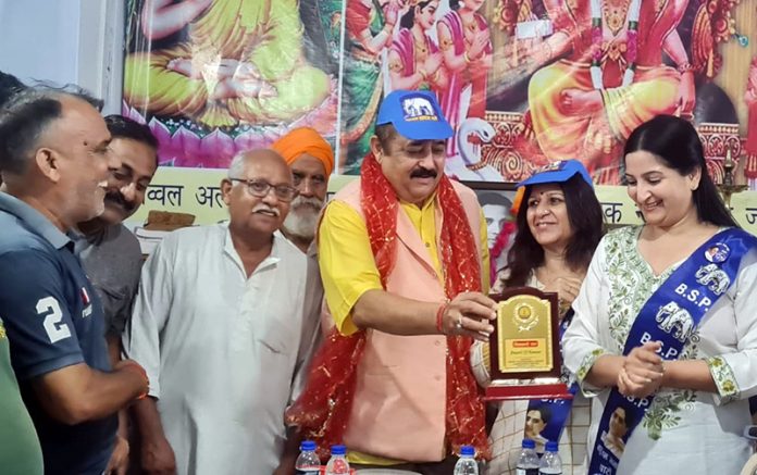 BSP candidate for Jammu East, Rajesh Gupta during an election meeting at Kacchi Chhawani. BSP candidate for Jammu East, Rajesh Gupta during an election meeting at Kacchi Chhawani.