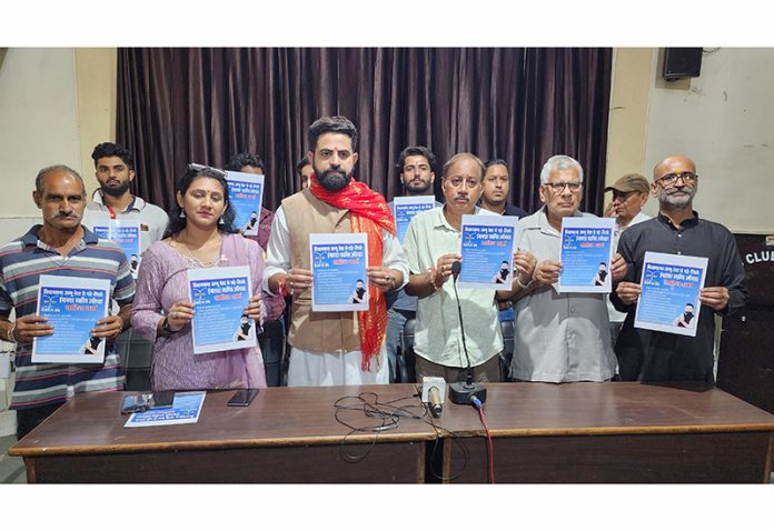 Independent candidate from Jammu West Constituency Sahil Sharma releasing his manifesto in Jammu on Wednesday. -Excelsior/Rakesh Independent candidate from Jammu West Constituency Sahil Sharma releasing his manifesto in Jammu on Wednesday. -Excelsior/Rakesh