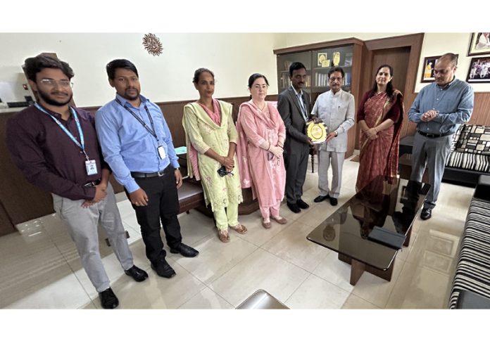 Gulchain Singh Charak presenting mementoes to key facilitators during valedictory function of training programme. Gulchain Singh Charak presenting mementoes to key facilitators during valedictory function of training programme.