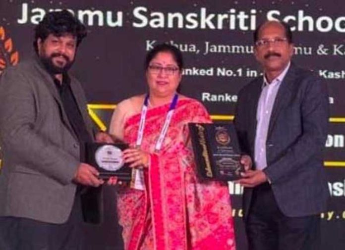 Jammu Sanskriti School Kathua Principal receiving award at Gurgaon. Jammu Sanskriti School Kathua Principal receiving award at Gurgaon.