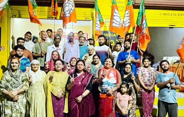 Senior BJP leader Rekha Mahajan conducting D2D campaign in RS Pura on Wednesday.