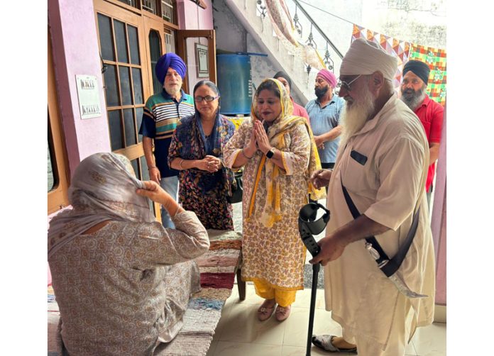 Apni Party leader, Pavneet Kour meeting people during door-to-door campaign at Simbal Camp. Apni Party leader, Pavneet Kour meeting people during door-to-door campaign at Simbal Camp.