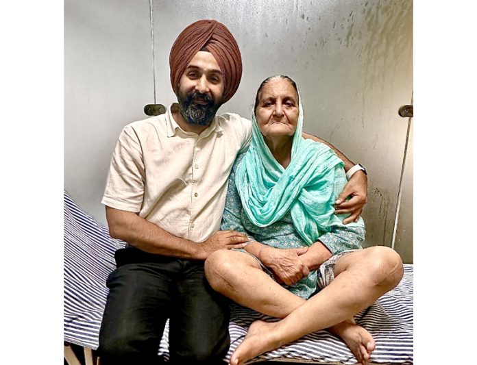 Dr Ranjit Singh posing with a patient on whom he performed knee replacement surgery. Dr Ranjit Singh posing with a patient on whom he performed knee replacement surgery.