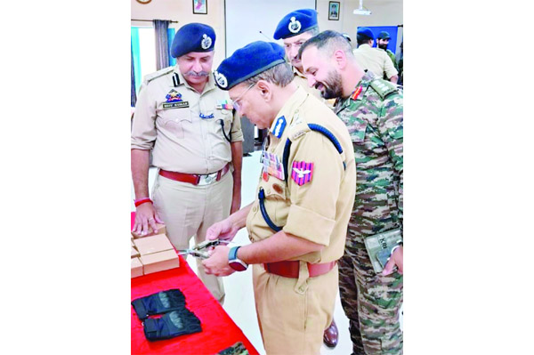 ADGP Jammu inspecting an equipment during the joint training of Army and JKP at Sunjwan Military Base on Saturday. ADGP Jammu inspecting an equipment during the joint training of Army and JKP at Sunjwan Military Base on Saturday.