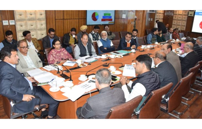 Minister for Agriculture Production Javed Ahmed Dar chairing a meeting in Srinagar. Minister for Agriculture Production Javed Ahmed Dar chairing a meeting in Srinagar.
