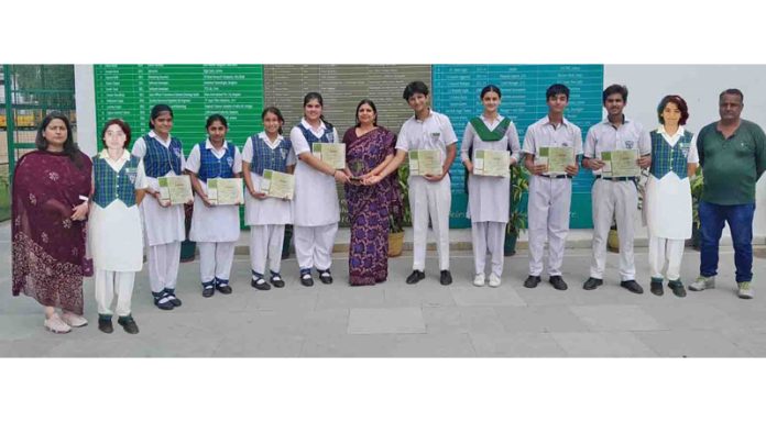 Students of DPS Jammu posing along with staff members. Students of DPS Jammu posing along with staff members.