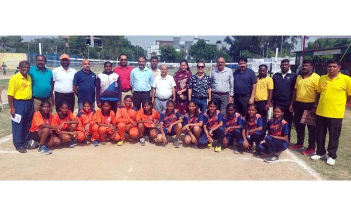 Players posing along with dignitaries during tournament.