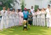 Players from J&K Blind and Para Judo Association posing for a group photograph with others after winning 3rd Visually Impaired Youth National Judo Championship.