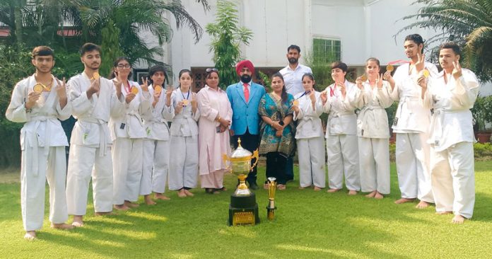 Players from J&K Blind and Para Judo Association posing for a group photograph with others after winning 3rd Visually Impaired Youth National Judo Championship. Players from J&K Blind and Para Judo Association posing for a group photograph with others after winning 3rd Visually Impaired Youth National Judo Championship.
